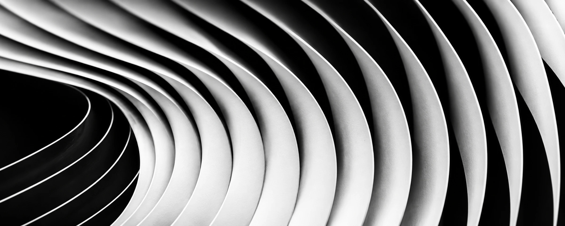 Generated sample artwork showing curved white paper folds against black.